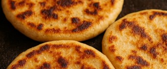 Pupusas cocinadas en estufa de gas